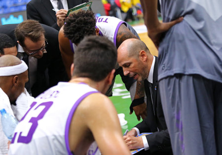 KYIV, UKRAINE - SEPTEMBER 26, 2019: Time-out of San Pablo Burgos team during the FIBA Basketball Champions League Qualifiers game BC Kyiv Basket v San Pablo Burgos. Head coach Joan Penarroya in centerのeditorial素材