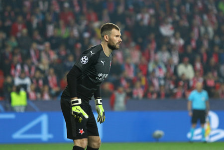 PRAGUE, CZECHIA - OCTOBER 23, 2019: Goalkeeper Ondrej Kolar of Slavia Praha in action during the UEFA Champions League game against Barcelona at Eden Arena in Prague. Kolar missed two. Slavia lost 1-2のeditorial素材