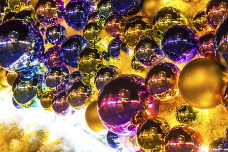 Close-up Christmas New Year baubles on a Christmas tree.の写真素材
