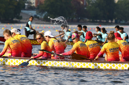 Kyiv, Ukraine - September 13, 2019: ICF Dragon Boat Club Crew World Championships 2019 on Dnipro river in Kyiv, Ukraine. D10 Junior Mixed 2000m Final, Team - SMK (Ukraine)のeditorial素材