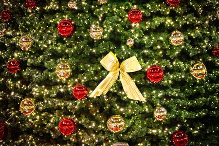 Close-up Christmas and New Year baubles on a Christmas tree.の写真素材