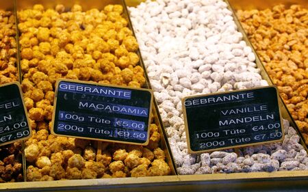 Close up market stall with the traditional german candied nuts (Gebrannte Mandeln)