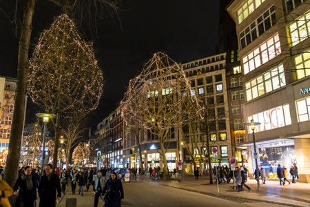 Hamburg, Germany - December 14, 2018: Night view of Monckebergstrasse (also called Mo), one of the main shopping streets in Hamburg, Germany. Street decorated with Christmas lightsのeditorial素材