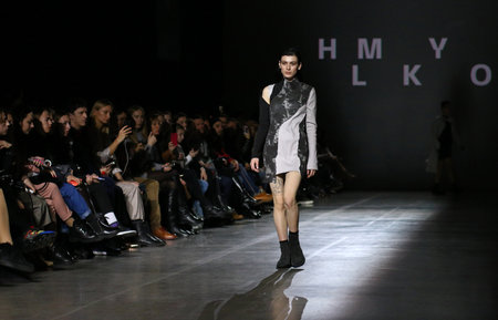 Kyiv, Ukraine - February 5, 2020: Model presents a collection of clothes by designer HMYLKO during the 46th Ukrainian Fashion Week season Fall/Winter 2020/21 at Mystetskyi Arsenal in Kyivのeditorial素材