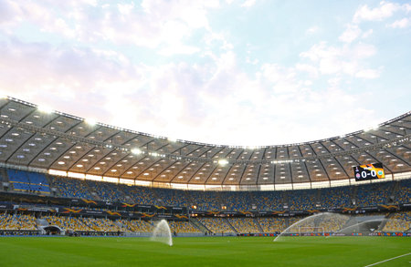 KYIV, UKRAINE - AUGUST 5, 2020: Panoramic view of NSC Olimpiyskyi stadium in Kyiv during the UEFA Europa League Round of 16 game Shakhtar Donetsk v Wolfsburgのeditorial素材