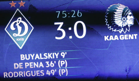 KYIV, UKRAINE - SEPTEMBER 29, 2020: Score of the game seen on electronic scoreboard of NSC Olimpiyskyi stadium in Kyiv during the UEFA Champions League play-off game Dynamo Kyiv v Gent. Dynamo won 3-0のeditorial素材