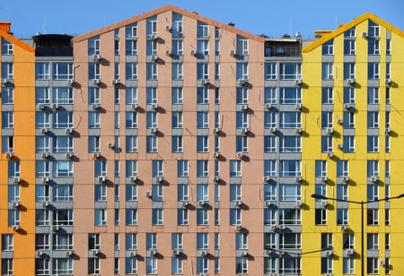 Kyiv, Ukraine - September 20, 2020: Bright colorful houses of modern housing estate Comfort Town in Dniprovskyi district. Sunny day, blue sky backgroundのeditorial素材
