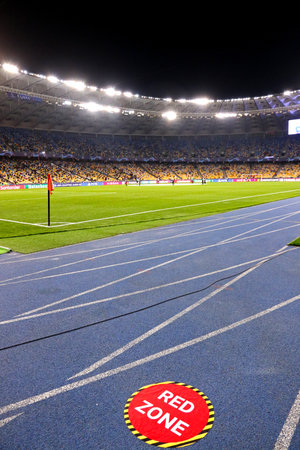 KYIV, UKRAINE - OCTOBER 27, 2020: Red zone sign on the ground of NSC Olimpiyskyi stadium in Kyiv seen during the UEFA Champions League game Shakhtar Donetsk v Interのeditorial素材