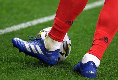 KYIV, UKRAINE - OCTOBER 10, 2020: Goalkeeper Manuel Neuer of Germany kicks a ball during the UEFA Nations League game against Ukraine at NSK Olimpiyskiy stadium in Kyiv. Close-up foots of goalkeeperのeditorial素材