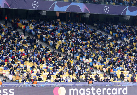 KYIV, UKRAINE - OCTOBER 20, 2020: Tribunes of NSK Olimpiyskiy stadium in Kyiv one third full due to COVID-19 quarantine restrictions seen during UEFA Champions League game Dynamo Kyiv v Juventusのeditorial素材