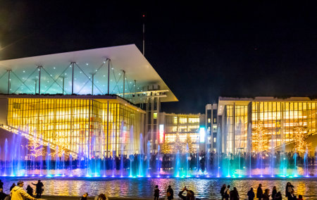 Athens, Greece - December 15, 2019: Night view of colourful dancing water fountain event at Stavros...