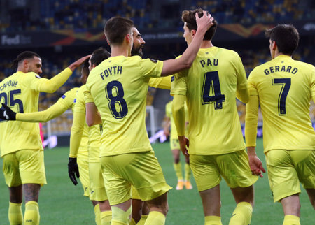 KYIV, UKRAINE - MARCH 11, 2021: Villarreal players react after scored a goal during the UEFA Europa League game against Dynamo Kyiv at NSC Olimpiyskyi stadium in Kyiv. Villarreal won 2-0のeditorial素材