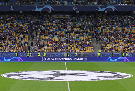 KYIV, UKRAINE - SEPTEMBER 14, 2021: Pitch of NSK Olimpiyskiy stadium with UEFA Champions League official logo in centre circle seen during the UEFA Champions League game Dynamo Kyiv v Benficaのeditorial素材