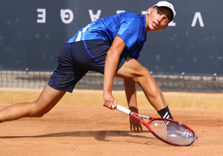 KYIV, UKRAINE - SEPTEMBER 7, 2021: Georgii KRAVCHENKO of Ukraine in action during ATP Challenger Kyiv Open game against Joris DE LOORE of Belgium at Kyiv Tennis Park in Kyivのeditorial素材