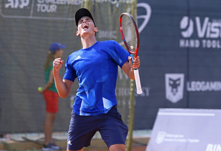 KYIV, UKRAINE - SEPTEMBER 7, 2021: Georgii KRAVCHENKO of Ukraine reacts after won the point during ATP Challenger Kyiv Open game against Joris DE LOORE of Belgium at Kyiv Tennis Park in Kyiv, Ukraineのeditorial素材
