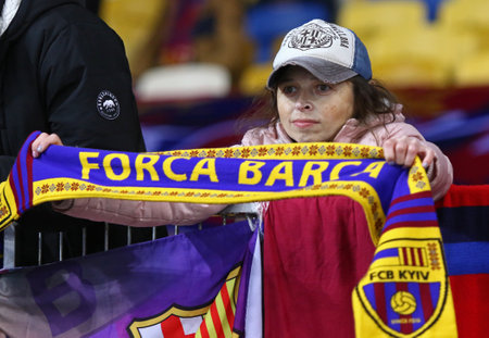 KYIV, UKRAINE - NOVEMBER 2, 2021: Barcelona supporters show their support during the UEFA Champions League game Dynamo Kyiv v Barcelona at NSC Olimpiyskyi stadium in Kyiv, Ukraineのeditorial素材