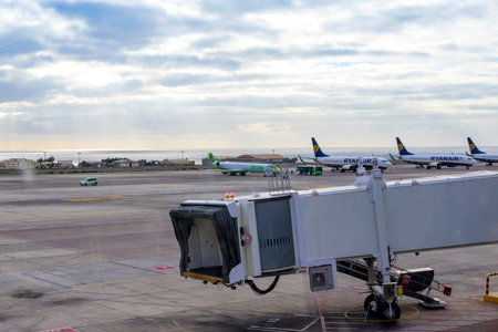 Las Palmas de Gran Canaria, Spain - December 13, 2018: Runway of the Las Palmas de Gran Canaria Airport (LPA), Canary islands. Atlantic ocean on the backgroundのeditorial素材