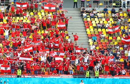 BUCHAREST, ROMANIA - JUNE 21, 2021: Austrian fans show their support during the UEFA EURO 2020 game Ukraine v Austria at National Arena Bucharest stadiumのeditorial素材