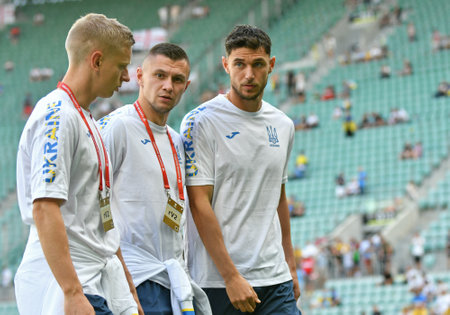 Wroclaw, Poland - September 9, 2023: Ukrainian players Oleksandr Zinchenko, Oleksandr Zubkov and Roman Yaremchuk walk on a pitch before the UEFA EURO 2024 Qualifying game Ukraine v Englandのeditorial素材