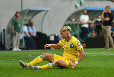 Wroclaw, Poland - September 9, 2023: Mykhailo Mudryk of Ukraine seats on the grass during the UEFA EURO 2024 Qualifying game Ukraine v England at Tarczynski Arena in Wroclaw. Game draw 1-1のeditorial素材