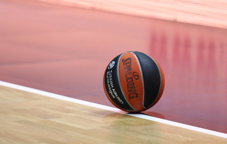 Berlin, Germany - April 4, 2024: Spalding, official Match Ball of the Turkish Airlines EuroLeague seen on the parquet of Uber Arena in Berlin during the basketball game ALBA Berlin v Partizan Belgradeのeditorial素材