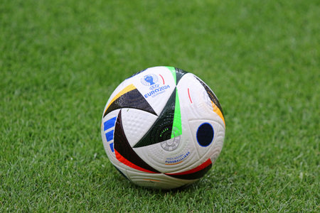 Berlin, Germany - June 14, 2024: Adidas FUSSBALLLIEBE, the Official Match Ball of UEFA EURO 2024 on the grass of Olympiastadion Berlin during training session of Croatia team before UEFA EURO 2024 game against Spainのeditorial素材