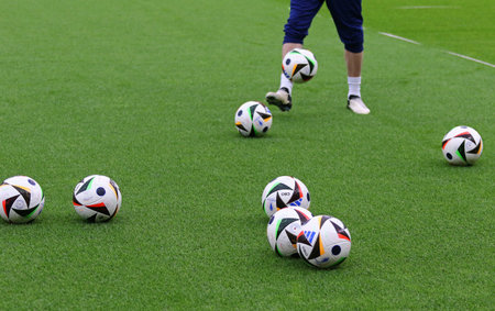 Berlin, Germany - June 14, 2024: Adidas FUSSBALLLIEBE, the Official Match Balls of UEFA EURO 2024 on the grass of Olympiastadion Berlin during training session of Croatia team before UEFA EURO 2024 game against Spainのeditorial素材