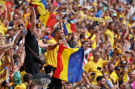Munich, Germany - June 17, 2024: Romanian supporters show their support during the UEFA EURO 2024 group stage match Romania v Ukraine at Munich Football Arena in Munich, Germanyのeditorial素材