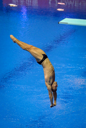 Berlin, Germany - March 24, 2024: Moritz WESEMANN of Germany performs during Men's 3m Springboard Final of the World Aquatics Diving World Cup 2024 in Berlin, Germanyのeditorial素材