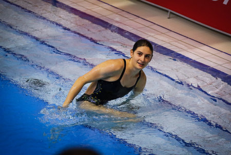 Berlin, Germany - March 22, 2024: Maddison KEENEY of Australia comes out of the water during Mixed 3m & 10m Team Event Final of the World Aquatics Diving World Cup 2024 in Berlin, Germanyのeditorial素材