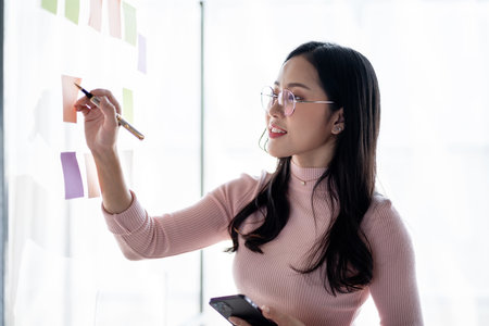 Business planning with share idea concept, Businesswoman holding smartphone and sharing idea with...