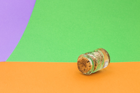 Little glass bottle on bright backgroundの写真素材