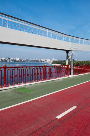 Cycle path on a pedestrian bridge across the Dnieper River. Kyiv. Ukraineの写真素材