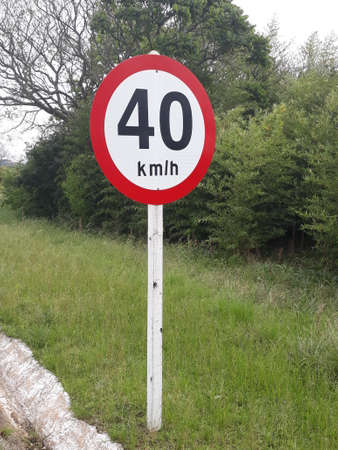 plate showing the maximum speed on the roadの写真素材