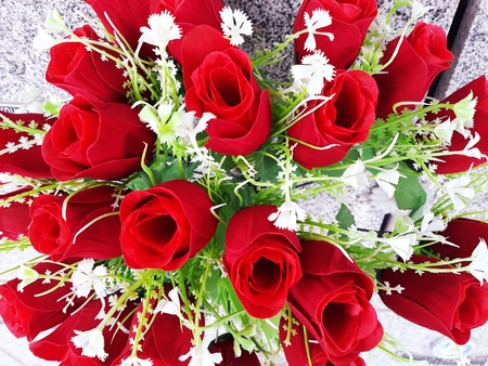 colorful and very cheerful flowers, red rosesの写真素材