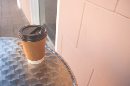 A cup of coffee on a table.の写真素材