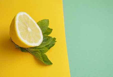 Lemon and mint leaves on bright background.の写真素材