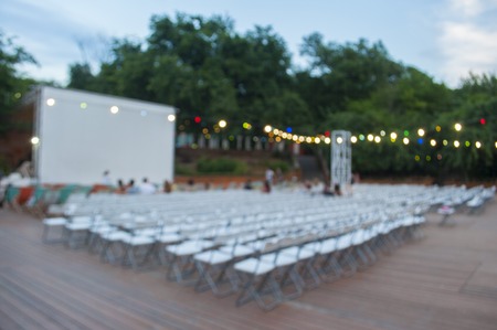 Beautiful bokeh background of the festival in the green city park.の写真素材