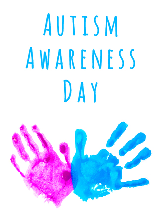 Colorful child's handprints isolated on white with copy space. World autism awareness day concept.の写真素材