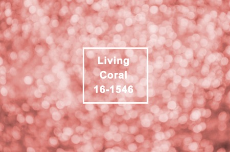 Coral color glittery shimmering background with blinking details.