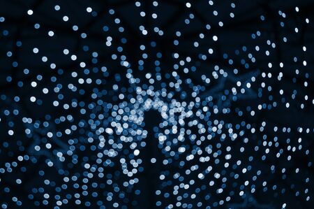 2020 color concept. Abstract blurred background with little lights. Party concept.