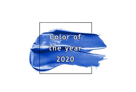 2020 color trend. A stroke of blue paint isolated on white.の写真素材