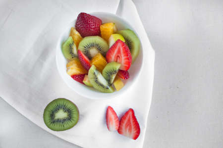 Fresh delicious fruit salad with strawberries and kiwi.の写真素材
