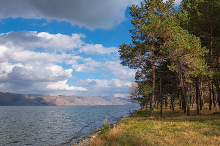 A beautiful landscape on a cloudy day on the banks of Sevan lake, Armenia.