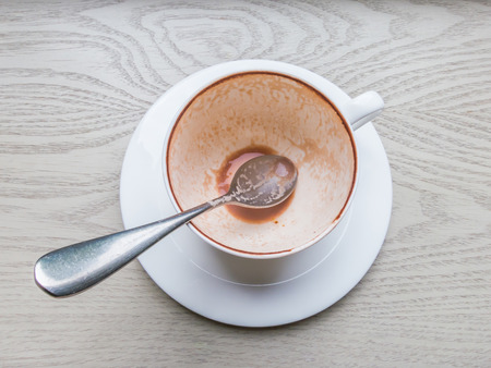 Top view empty cup of cocoa on wooden tableの写真素材