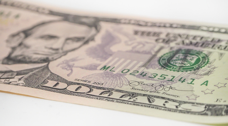 Abstract and closeup of dollar bill.