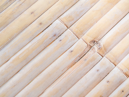 Closeup of diagonal striped pattern of dry bamboo.の写真素材