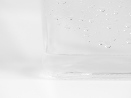 Black and white tone. Closeup of drops of water on glassの写真素材