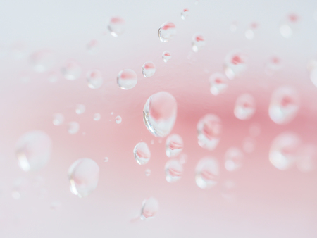 Closeup of water drops on glassの写真素材