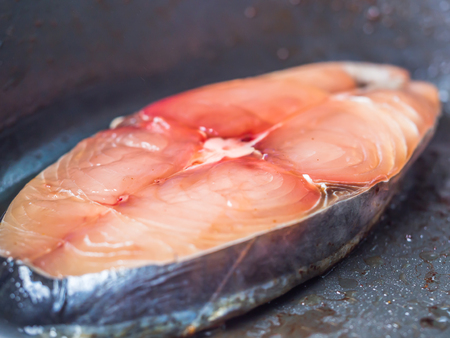 Closeup of raw mackerel fish was sliced for cooking.